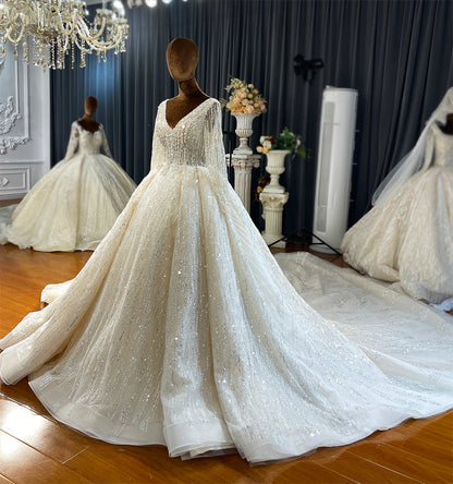 Latest Wedding Design Luxury High -Quality Bride Dresses Long -Sleeved Fringe Sequin White Wedding Dress